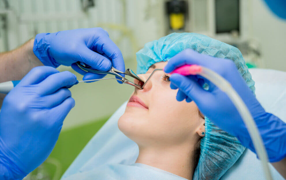 Woman getting nose surgery