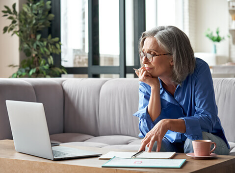 Woman doing research with laptop